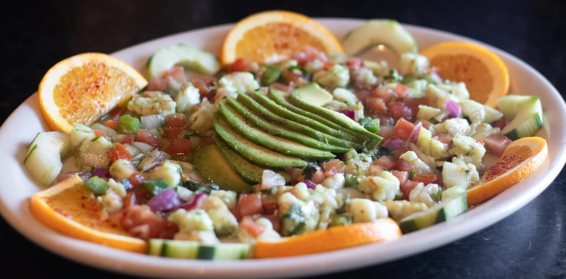 Fresh aguachile with shrimp, avocado, cucumber, and orange